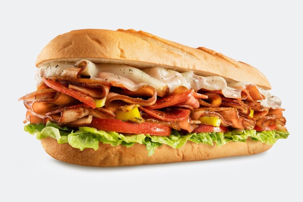 HOT SHOT ITALIANO - Oven-Roasted Turkey, Pepperoni, Banana Peppers, Melted Provolone then topped with Lettuce, Tomato, Mayo & Italian Seasoning. Charleys Italiano